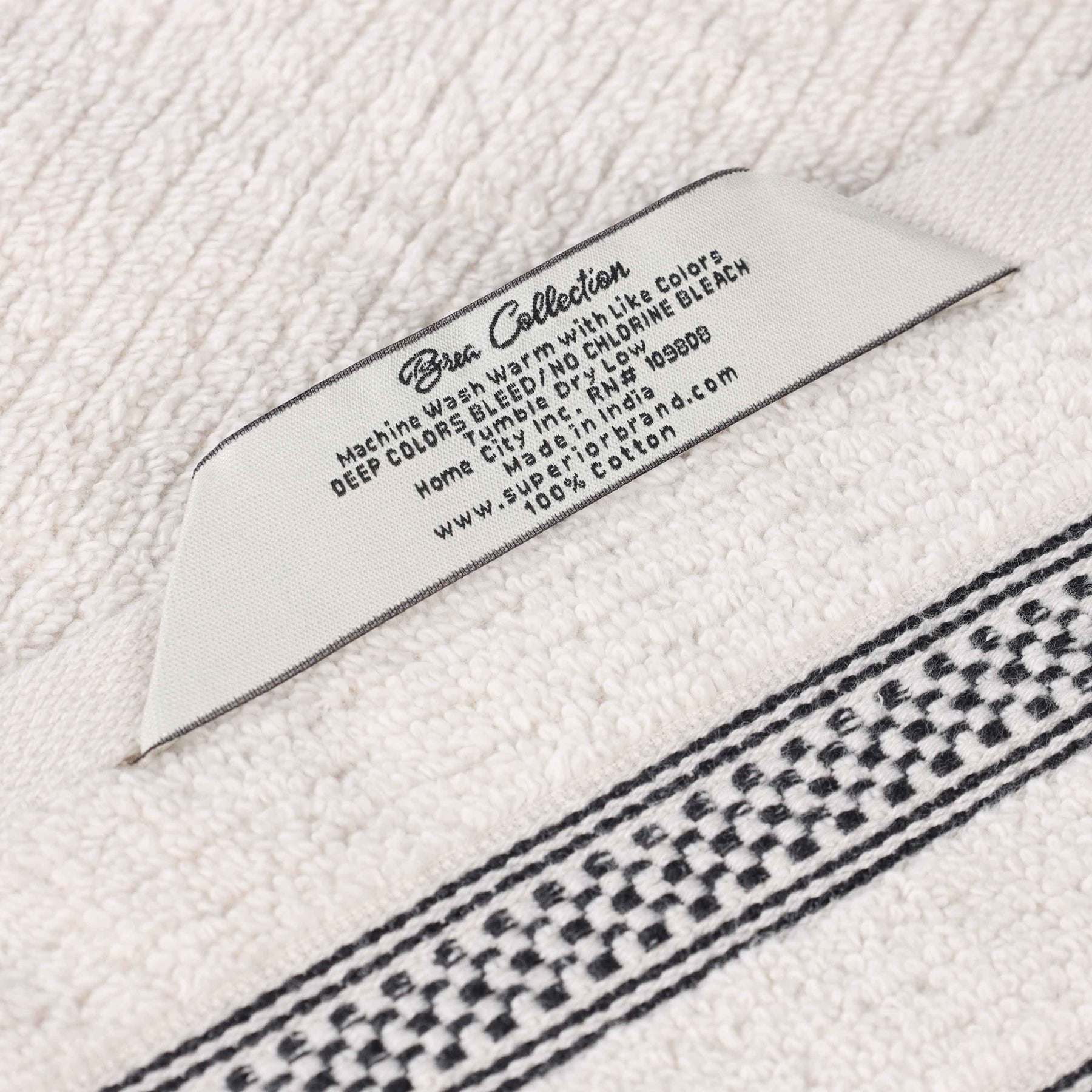 Brea Zero Twist Cotton Ribbed Geometric Border Bath Sheet Set of 2