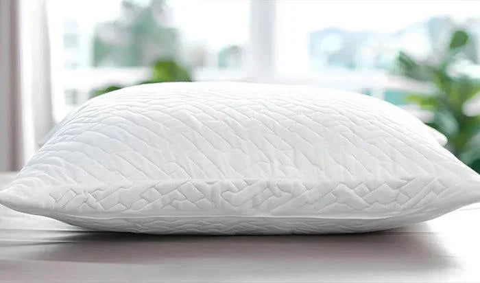 White quilted pillow with diamond pattern, soft luxury bedding for comfortable sleep