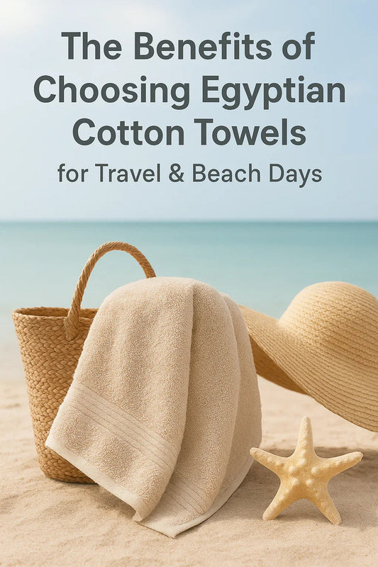 Egyptian cotton beach towel on sand with straw hat and basket, perfect for travel and beach days