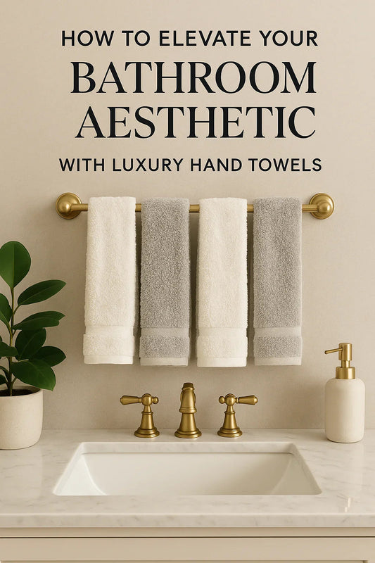 Luxury hand towels in white and gray elevate bathroom aesthetic with gold fixtures and marble sink