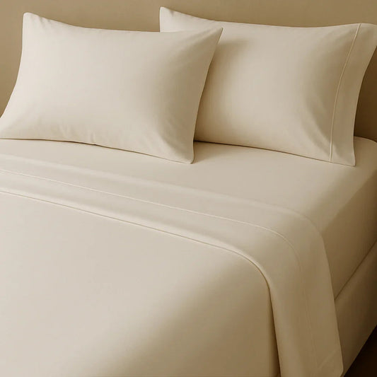 Cream Egyptian cotton bed sheets and pillowcases for luxury bedding comfort