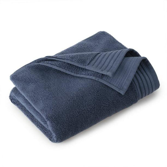 Navy blue luxury bath towel with ribbed texture, ideal for premium bathroom essentials
