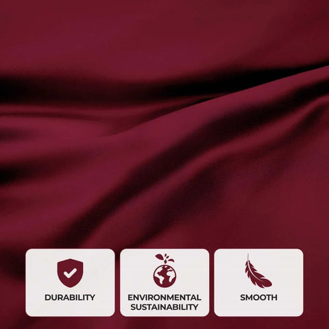 Luxury burgundy bedding fabric highlighting durability, eco-friendly sustainability, and smooth texture for premium comfort.