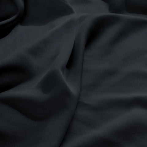 Luxury black Egyptian cotton bedding fabric with soft, smooth texture and elegant drape