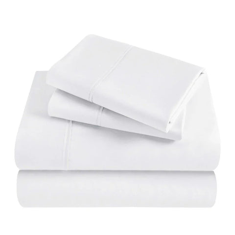 Crisp white Egyptian cotton bed sheets set, luxury bedding for a clean, minimalist bedroom